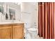 Functional bathroom with a vanity, a toilet, and a shower-tub combination with neutral finishes at 1104 Pinto Rock Ln # 101, Las Vegas, NV 89128