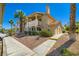 Charming multi-Gathering home with well-maintained landscaping, desert rock, and mature palm trees at 1104 Pinto Rock Ln # 101, Las Vegas, NV 89128