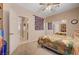 Inviting bedroom with neutral tones, mirrored closet, and carpeted floors, offering a serene retreat at 1316 Borderwood Ln, North Las Vegas, NV 89031