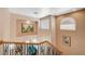 Well-lit foyer provides an upper-level view of the downstairs living area at 1316 Borderwood Ln, North Las Vegas, NV 89031