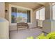 Covered porch with seating area at 1316 Borderwood Ln, North Las Vegas, NV 89031