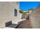Narrow side yard bordered by block wall fencing leads to rear of house at 1316 Borderwood Ln, North Las Vegas, NV 89031