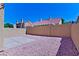 Backyard with a rock garden, providing a low-maintenance and attractive outdoor space at 1663 Cloister Ave, Henderson, NV 89014