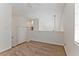 Upstairs bedroom area with neutral carpet and closet at 1663 Cloister Ave, Henderson, NV 89014