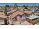 Aerial view of a well-maintained home featuring a unique backyard patio design at 1711 Ember Glow Cir, Las Vegas, NV 89119