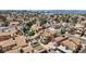 A panoramic view of a dense suburban neighborhood, showcasing many rooftops and an orderly layout at 1711 Ember Glow Cir, Las Vegas, NV 89119