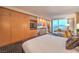 Comfortable bed and lounge area, with a kitchenette and scenic city views at 2000 Fashion Show Dr # 4105, Las Vegas, NV 89109