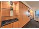 Built in storage with shelves, tv and granite countertop at 2000 Fashion Show Dr # 4105, Las Vegas, NV 89109