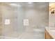 Bathroom featuring glass enclosed shower with marble tile and towel bars at 2000 N Fashion Show Dr # 4015, Las Vegas, NV 89109