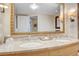 Elegant bathroom showcasing marble countertops, double sinks, and decorative lighting at 2000 N Fashion Show Dr # 4015, Las Vegas, NV 89109