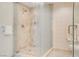 Modern bathroom featuring a glass enclosed shower with tiled walls and floor at 2000 N Fashion Show Dr # 4015, Las Vegas, NV 89109