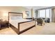A comfortable and luxurious bedroom with a large window offering stunning city views at 2000 N Fashion Show Dr # 4015, Las Vegas, NV 89109