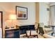 Bedroom featuring a desk, comfortable armchairs, and a bedside table with a lamp at 2000 N Fashion Show Dr # 4015, Las Vegas, NV 89109