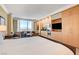 Stylish bedroom with a kitchenette and a seating area, offering a comfortable and convenient living space at 2000 N Fashion Show Dr # 4015, Las Vegas, NV 89109