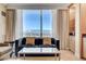 Comfortable living room with built in cabinet, and large windows framing panoramic views at 2000 N Fashion Show Dr # 4015, Las Vegas, NV 89109