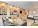 A stylish living room and kitchenette with modern appliances and a comfortable seating area at 2000 N Fashion Show Dr # 4015, Las Vegas, NV 89109