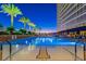 Outdoor pool area featuring lounge chairs, palm trees, and a high-rise building at 2000 N Fashion Show Dr # 4015, Las Vegas, NV 89109
