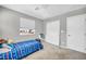 Clean bedroom with carpet flooring, and closet storage at 2024 Mystic Wave Rd, North Las Vegas, NV 89031