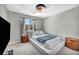 Bedroom with platform bed, side tables, and modern light fixture at 2024 Mystic Wave Rd, North Las Vegas, NV 89031