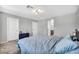 Cozy bedroom with soft carpet and modern décor, bathed in natural light at 2024 Mystic Wave Rd, North Las Vegas, NV 89031
