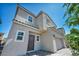 Charming two-story home with a two-car garage and desert landscaping at 2024 Mystic Wave Rd, North Las Vegas, NV 89031