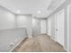 Upstairs hallway with neutral carpet, light gray walls, white doors, and recessed lighting at 2024 Mystic Wave Rd, North Las Vegas, NV 89031