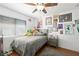 Cozy bedroom featuring a bed, window, and personalized decorations at 2229 Armacost Dr, Henderson, NV 89074