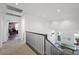 Second story loft overlooking a lounge with a pool table at 2229 Armacost Dr, Henderson, NV 89074