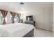 This is the main bedroom with a large comfortable bed, and neutral-toned walls at 2254 Florence Ave, Las Vegas, NV 89119