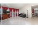 Spacious living room with tile flooring, access to the pool, and comfortable seating area at 2254 Florence Ave, Las Vegas, NV 89119