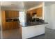 Spacious kitchen features tile flooring, plentiful cabinet space, and stainless steel appliances at 2406 Pebble Springs Ct, Henderson, NV 89074