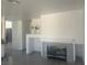 Living room features a fireplace, tile flooring, and bright light at 2406 Pebble Springs Ct, Henderson, NV 89074