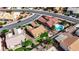 Aerial view of a single-Gathering home with a pool, putting green, and desert landscaping at 2605 Orchid Valley Dr, Las Vegas, NV 89134