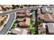 Aerial view of the home showcasing the pool, putting green, and neighborhood at 2605 Orchid Valley Dr, Las Vegas, NV 89134