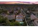 Panoramic aerial view of the neighborhood featuring the pool, covered patio, and solar panels at 364 Trentino Alto St, Henderson, NV 89012