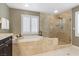 Bathroom featuring a shower, a tub, and double sinks at 364 Trentino Alto St, Henderson, NV 89012