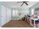 Bright bedroom with a built-in slide, chevron accent wall, and large closet at 364 Trentino Alto St, Henderson, NV 89012
