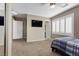Bedroom boasts recessed lights, a TV, and a window with shutters at 364 Trentino Alto St, Henderson, NV 89012