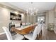 Elegant dining room with hardwood floors and a decorative chandelier at 364 Trentino Alto St, Henderson, NV 89012