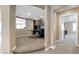 Home office area with a desk, chair, built-in cabinets, and carpet at 364 Trentino Alto St, Henderson, NV 89012