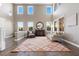 Elegant living room featuring high ceilings, abundant natural light, and a stylish fireplace at 364 Trentino Alto St, Henderson, NV 89012