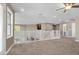 Spacious loft area with carpet, a ceiling fan, and a view of the lower level at 364 Trentino Alto St, Henderson, NV 89012