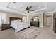 Main bedroom boasts a tray ceiling, a ceiling fan, and lots of natural light at 364 Trentino Alto St, Henderson, NV 89012
