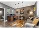 Charming office space with brick accent wall, decorative film reels, and a cow hide rug at 364 Trentino Alto St, Henderson, NV 89012