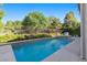 A private backyard featuring a refreshing pool and lush landscaping, offering a peaceful escape from the everyday at 364 Trentino Alto St, Henderson, NV 89012