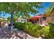 Outdoor living space featuring a patio, greenery, and a relaxing atmosphere at 3877 Platis Cir, Las Vegas, NV 89103