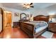 Spacious main bedroom boasts a ceiling fan, hardwood floors, and well-lit, comfortable interior at 3877 Platis Cir, Las Vegas, NV 89103