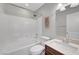 Well-lit bathroom with shower-tub combo and white vanity at 3908 Total Eclipse St, Las Vegas, NV 89129