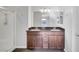 A view of a bathroom showcasing a double vanity and a glass-enclosed shower at 3908 Total Eclipse St, Las Vegas, NV 89129