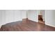 Spacious bedroom with wood floors, and access to an ensuite bathroom at 3908 Total Eclipse St, Las Vegas, NV 89129